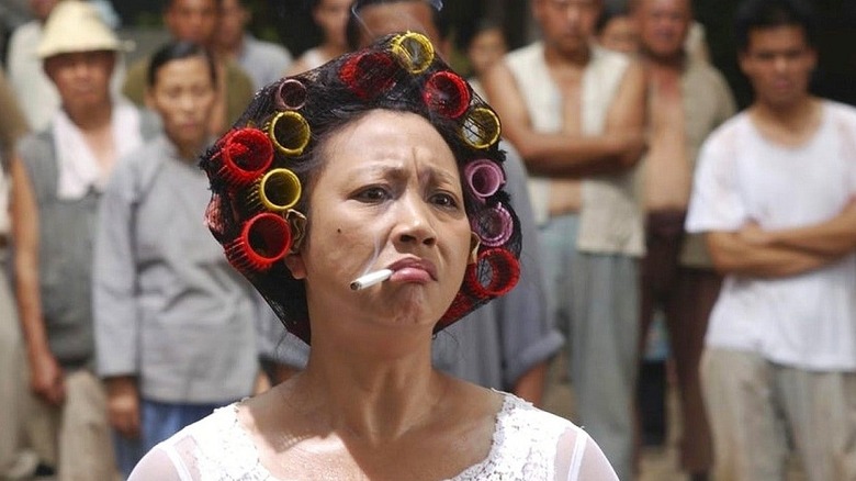 Qiu Luen in "Kung Fu Hustle" wearing curlers smoking