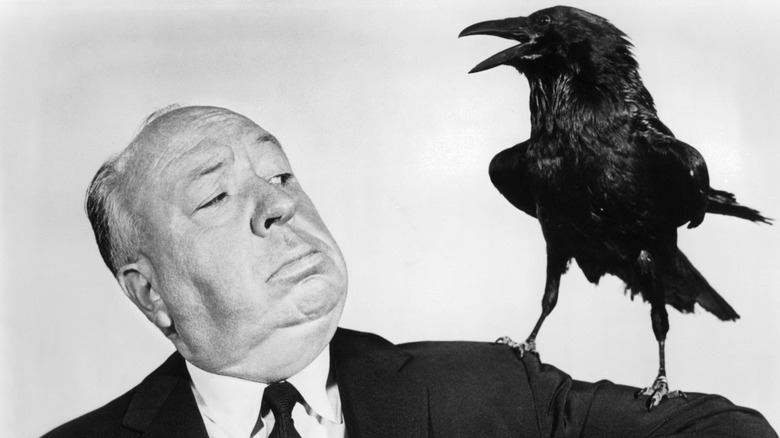 Alfred Hitchcock in a still for "The Birds"