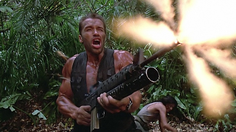 Arnold Schwarznegger as Dutch shooting in Predator