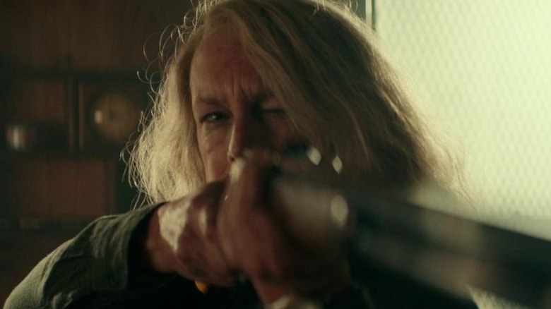 Laurie Strode holding a shotgun in Halloween 2018