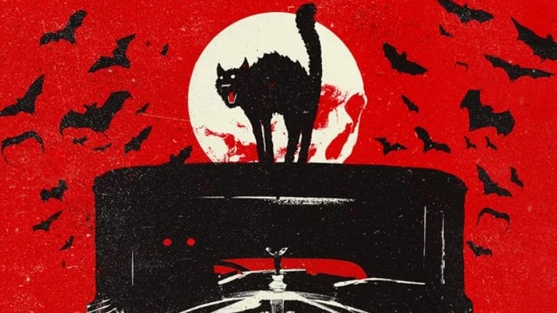 Screeching cat on top of a car on the cover of Joe Hill's NOS4A2