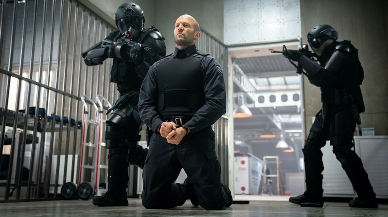 Jason Statham as Patrick Hill pretending to be in trouble in Wrath of Man