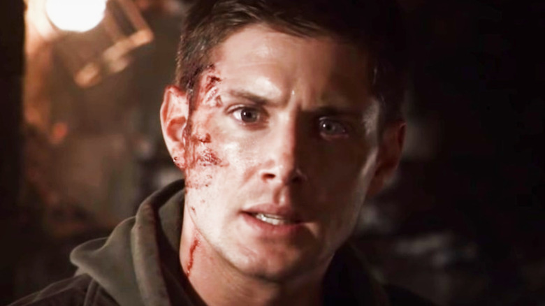 Jensen Ackles as Tom Hanniger, blood staining his face in My Blood Valentine 3D