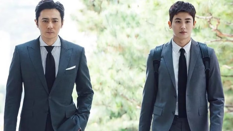 Choi Kang-seok (Jang Dong-gun) walks alongside Go Yeon-woo (Park Hyung-sik) in Suits (2018)