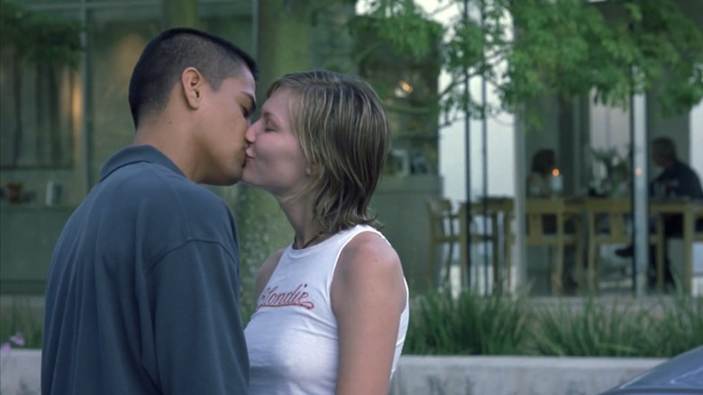 Carlos (Jay Hernandez) kisses Nicole (Kirsten Dunst) outside in Crazy/Beautiful