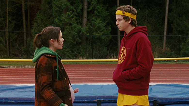 Juno (Elliot Page) shows Paulie (Michael Cera) her pregnant belly in Juno