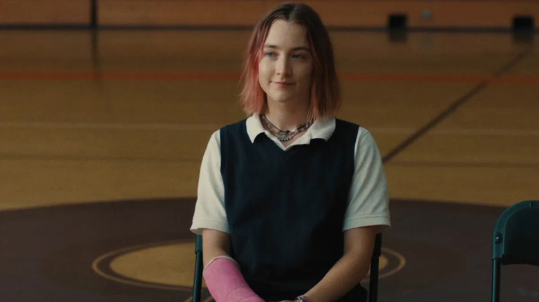 Christine (Saoirse Ronan) sits in a gym in Lady Bird