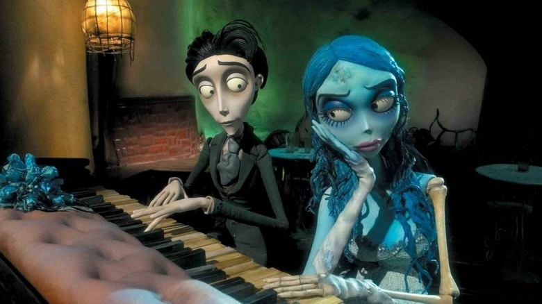 Victor Van Dort (Johnny Depp) sits at a piano with Emily (Helena Bonham Carter) in Corpse Bride