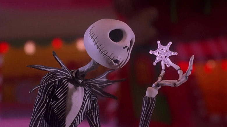 Jack Skellington (Chris Sarandon) holds a snowflake in The Nightmare Before Christmas