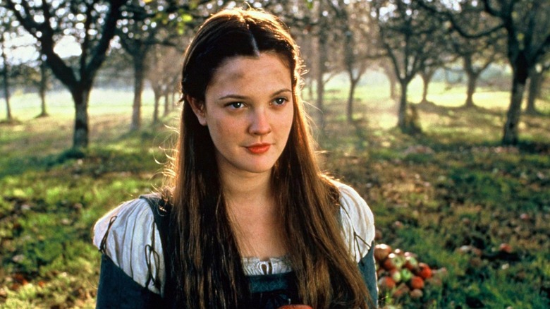 Danielle (Drew Barrymore) with dirt smudge in orchard in Ever After