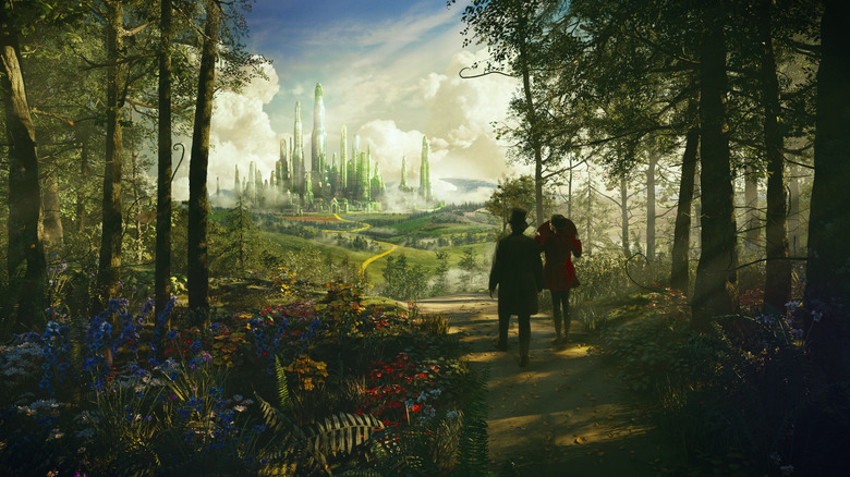 Oz (James Franco) and Theodora (Mila Kunis) walking yellow brick road in Oz the Great and Powerful