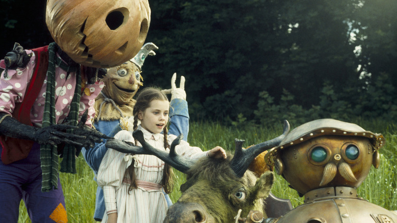 Dorothy (Fairuza Balk) with Jack Pumpkinhead, Scarecrow, Tik-Tok, and the Gump in Return to Oz