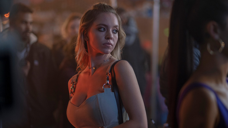 Sydney Sweeney as Cassie looking out into a crowd in Euphoria