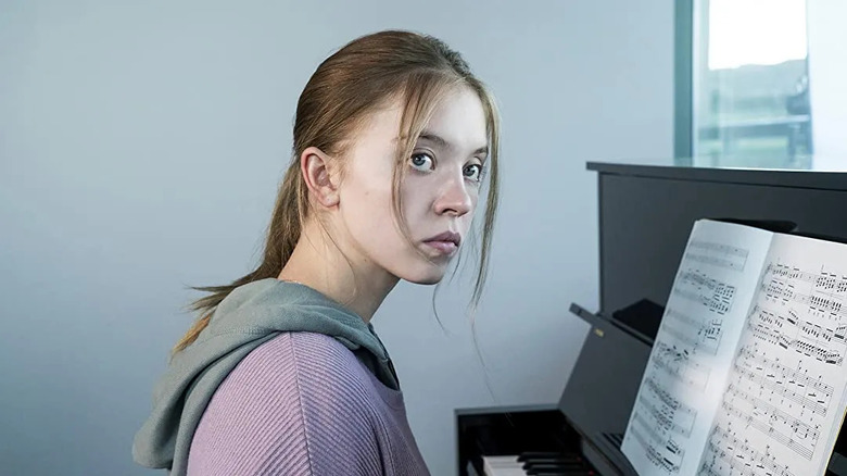 Sydney Sweeney as Juliet sitting at a piano in Nocturne