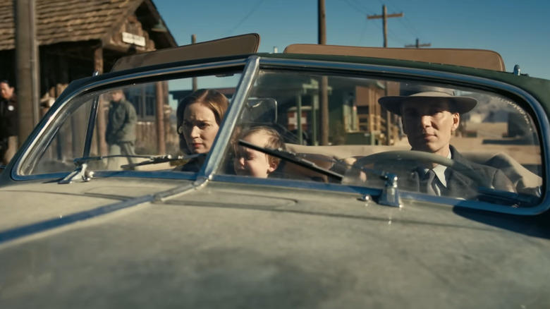 Oppenheimer, Kitty, and Peter in car