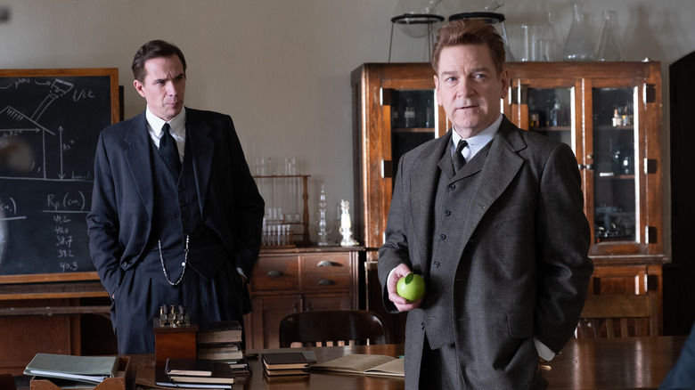 Patrick Blackett and Niels Bohr in classroom with apple