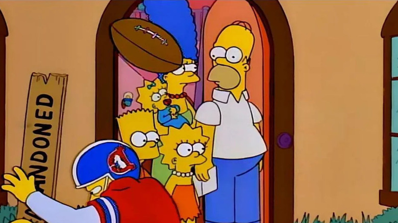 Homer watching Denver Broncos mess up on The Simpsons