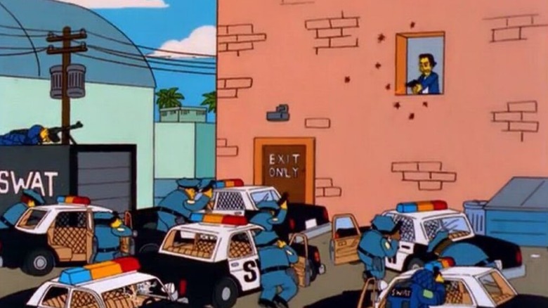 Robert Downey Jr. shooting at the police on The Simpsons