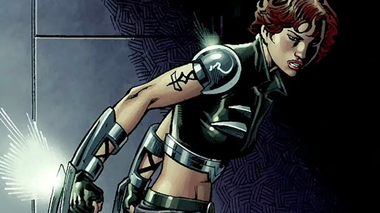 Scandal Savage wearing cropped leather with knifes on her hands in comic