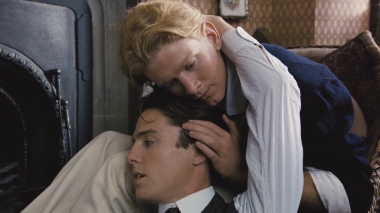 James Wilby as Maurice Hall caressing the head of Hugh Grant as Clive Durham in Maurice