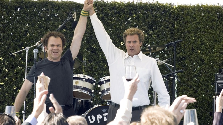 Will Ferrell and John C. Reilly holding hands