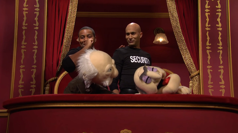 Kenan Thompson and Keegan Michael-Key standing over old man Muppets