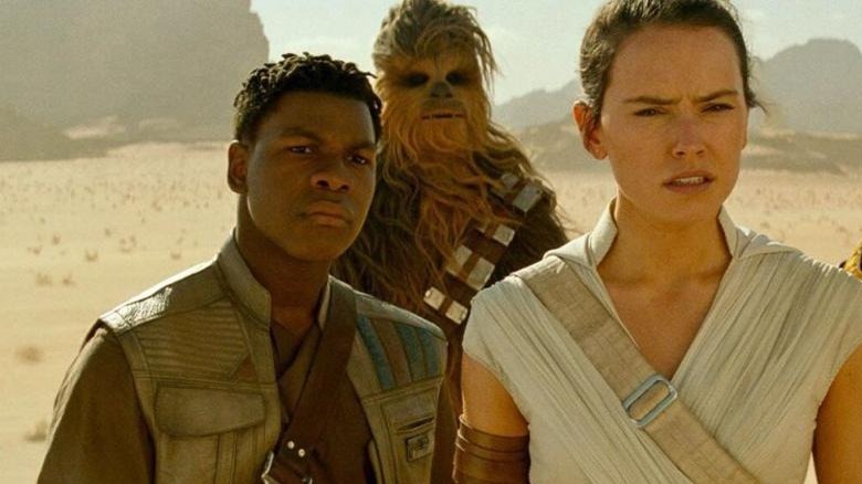 Finn, Chewbacca, and Rey staring at the horizon in Rise of Skywalker