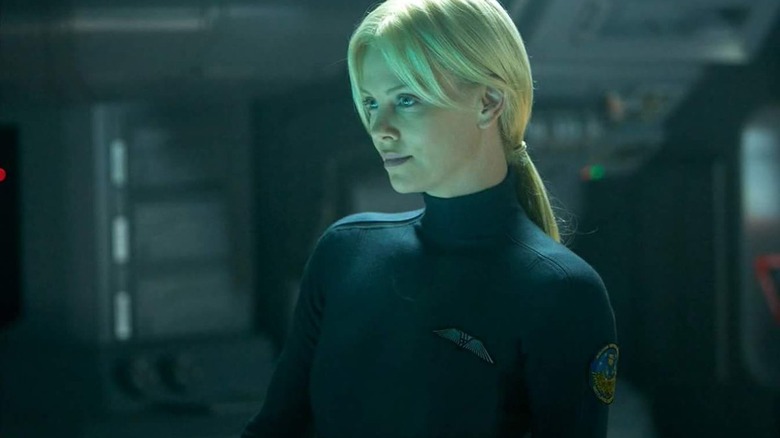 Meredith Vickers smiles in a skintight suit in Prometheus