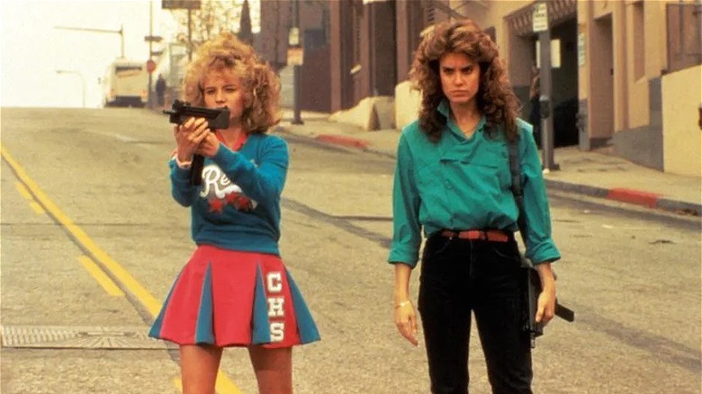 Two young women stand in street in Night of the Comet