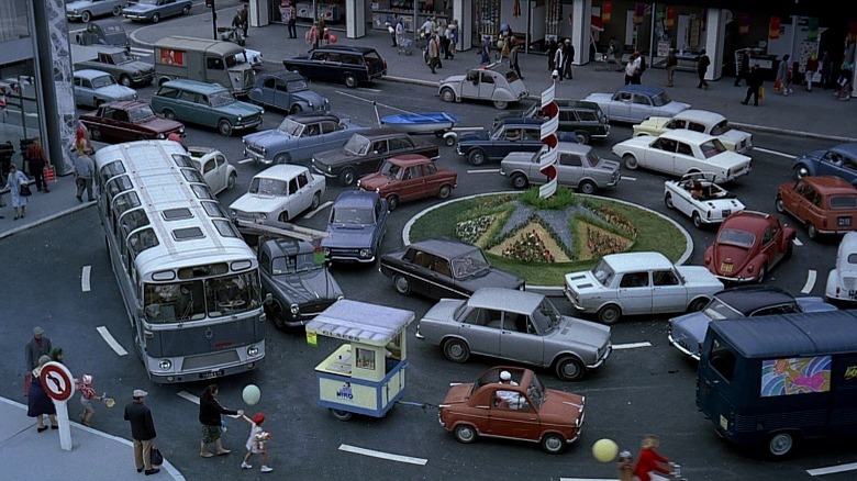 Playtime's Cars going around an absurd roundabout