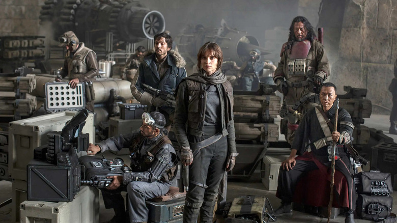 Bodhi, Cassian, Jyn, Baze, Chirrut posed in Rogue One