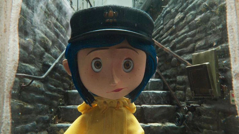 Coraline walks down rocky stairs