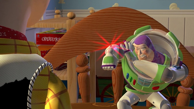 Toy Story Buzz aims fake laser at Woody