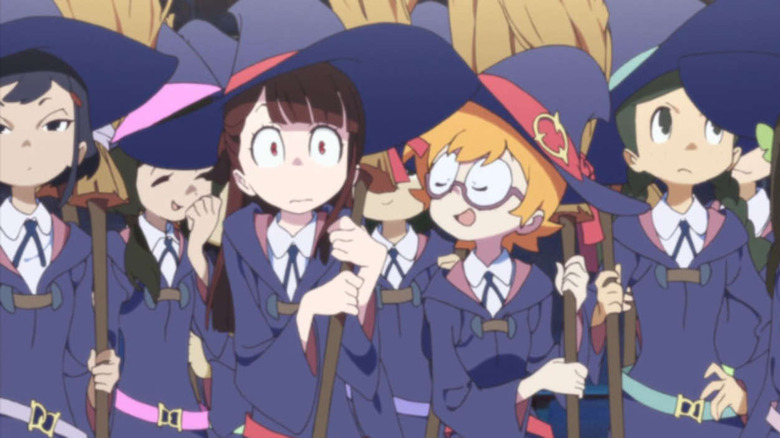 A young witch looks terrified