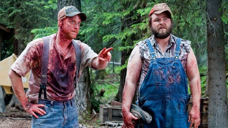 Tucker and Dale, spattered with blood