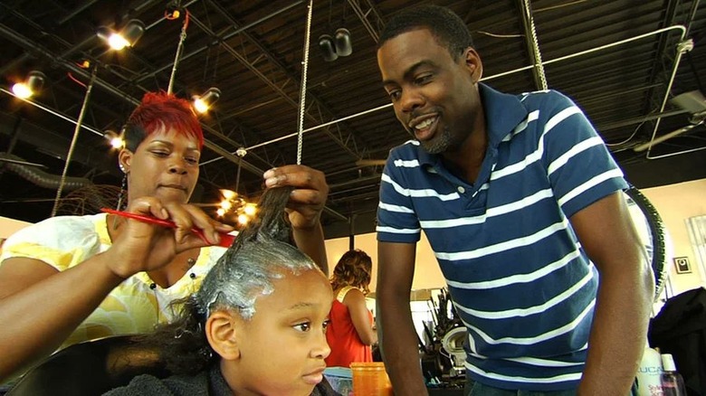 Good Hair Chris Rock watches hair washed