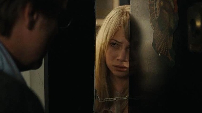 Michelle Williams opening the door for Phillip Seymour Hoffman in Synecdoche, New York