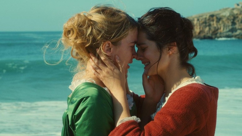 Noémie Merlant and Adèle Haenel caressing "Portrait of a Lady on Fire"