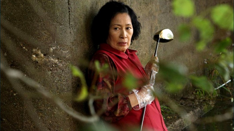 Kim Hye-ja wields golf club in Mother