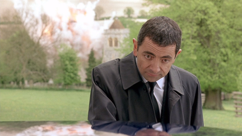 Johnny English not noticing a massive explosion behind him