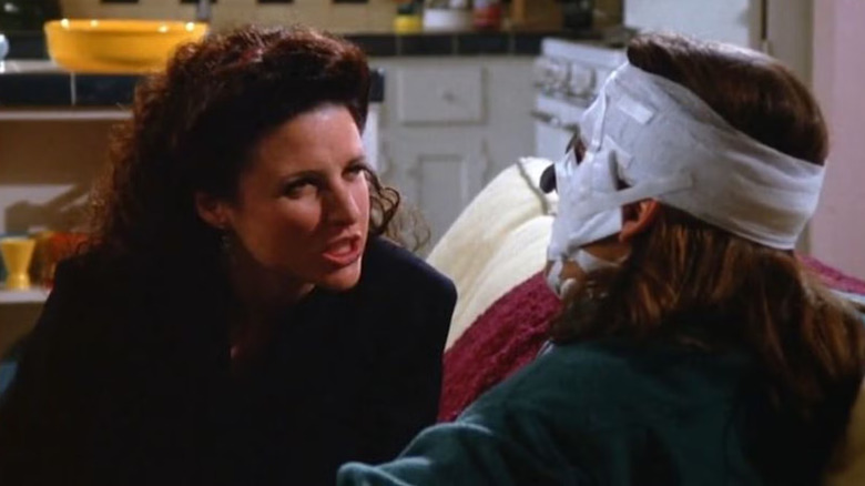 Julia Louis-Dreyfus as Elaine talking to Dan Cortese as Tony in Seinfeld