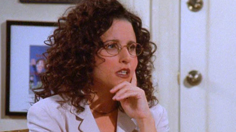 Julia Louis-Dreyfus as Elaine contemplating sponge-worthiness in Seinfeld