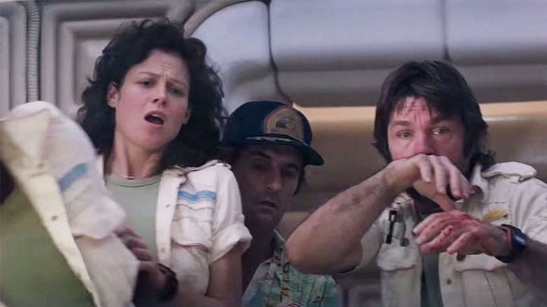 The crew of the Nostromo recoil in horror