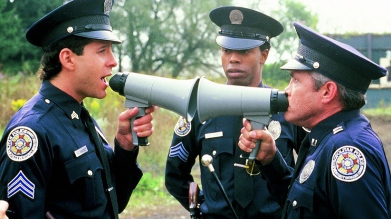 Mahoney wielding a megaphone at his rival