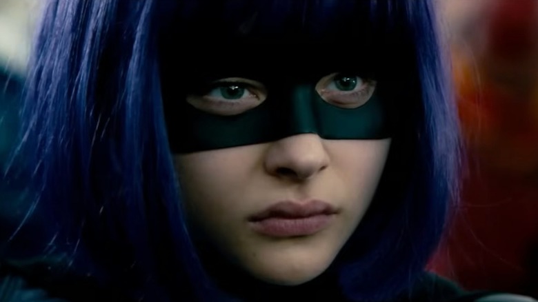 Chloe Grace Moretz as Hit-Girl looking mean in Kick Ass 2