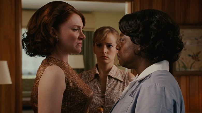 Bryce Dallas Howard as Hilly and Viola Davis as Aibileen in The Help, staring angrily at each other