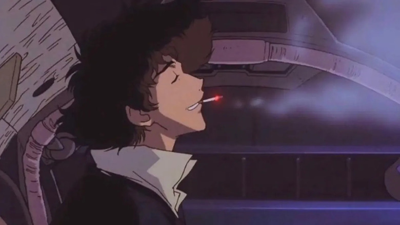 Spike Spiegel smokes a cigarette in a cockpit on Cowboy Bebop