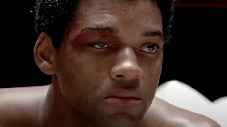 Will Smith as Muhammad Ali is bruised and bloodied in Ali