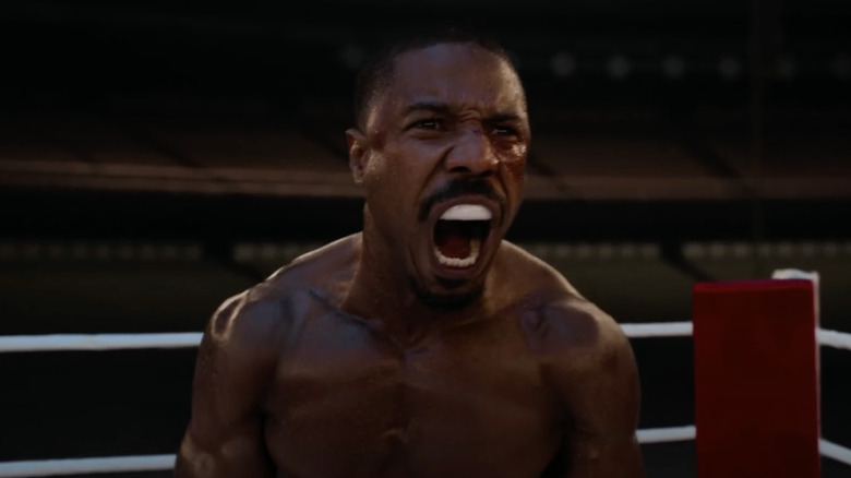 Michael B. Jordan as Adonis Creed screams in the ring in Creed III