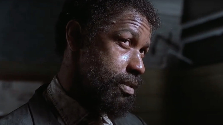 Denzel Washington as Rubin "Hurricane" Carter looking sad in The Hurricane